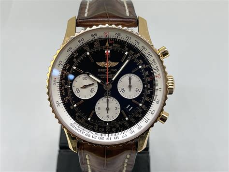 breitling with rose gold bezel and mesh with white dial|Breitling navitimer 01 rose gold.